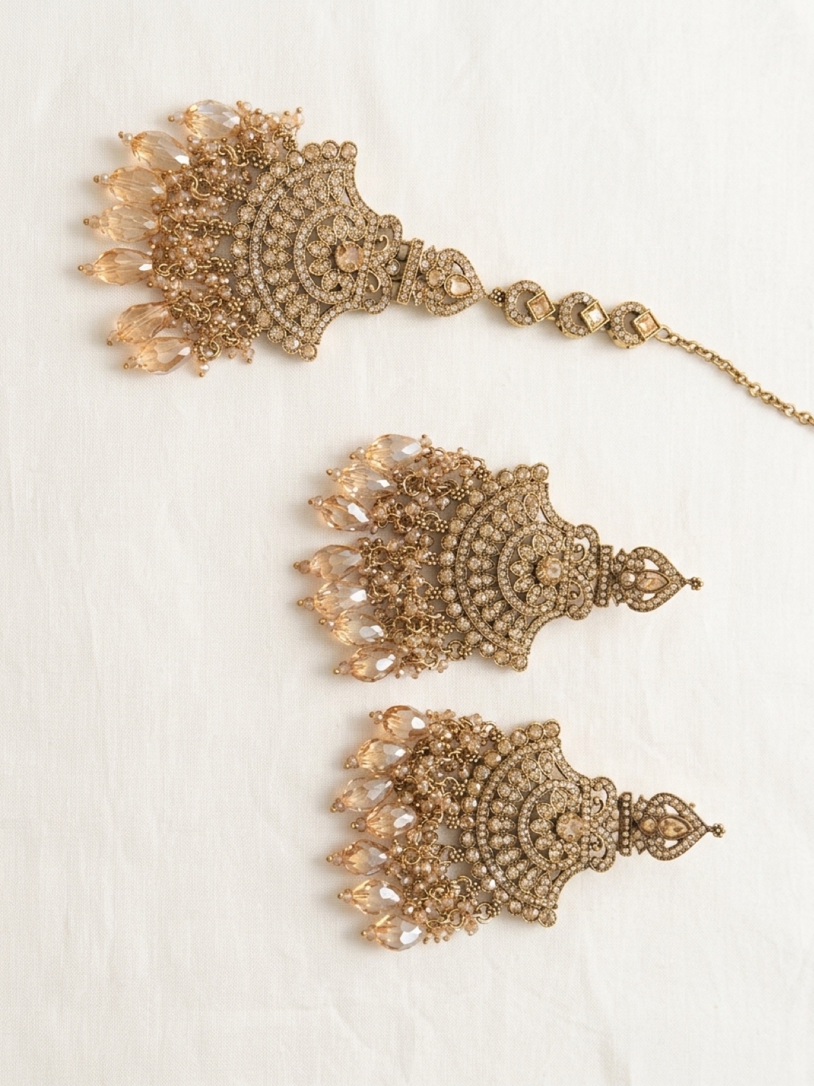 beautiful golden earring with tikka elegant traditinal jewellery for special occassion beautiful golden earring with tikka elegant traditinal jewellery for special occassion