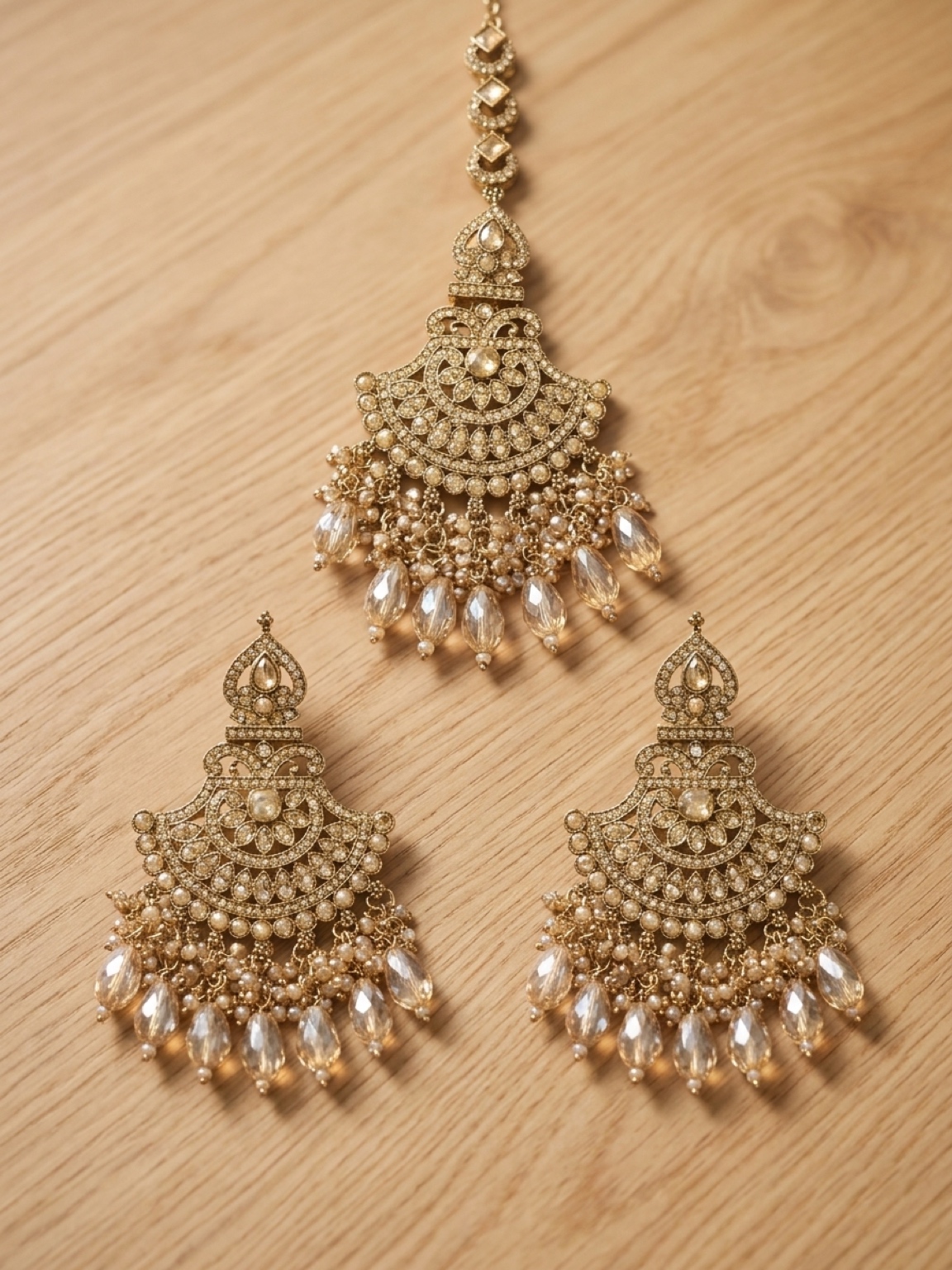 beautiful golden earring with tikka elegant traditinal jewellery for special occassion beautiful golden earring with tikka elegant traditinal jewellery for special occassion